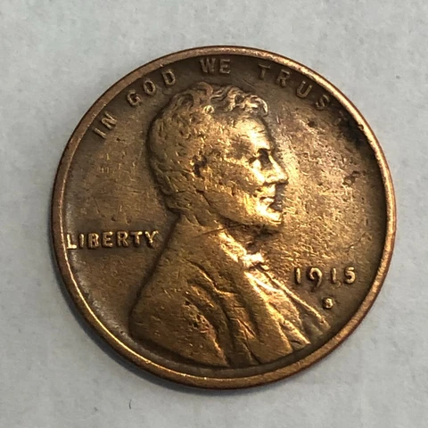 1915-S Lincoln wheat cent, VF. Old cleaning has somewhat re-toned. #1 Cover