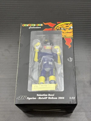 MINICHAMPS VALENTINO ROSSI 1/12 MODEL FIGURE MOTOGP 2004 THE KISS GP SOUTH AFRIC - Image 1 of 4