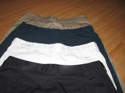 Lote de {4} pares de pantalones cortos de golf Nike para hombre talla 32 frente plano blanco tostado azul negro Foto 1 de 4