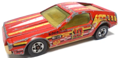 1979 HOT WHEELS DELOREAN #10 RED 1:64 DIECAST 2 3/4" RACE CAR W/ YELLOW & WHITE - Image 1 of 4