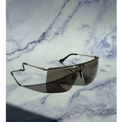 NUEVO Gafas de sol Gucci GG1096S doradas sin montura marrón con escudo Foto 1 de 4