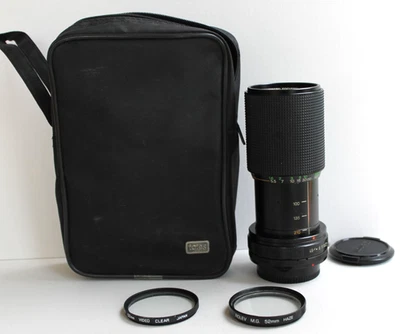 Vivitar MC Macro Focusing Zoom Lens 52mm 70 – 210 mm 1:4.5 W/ 2 filters and case - Image 1 of 4