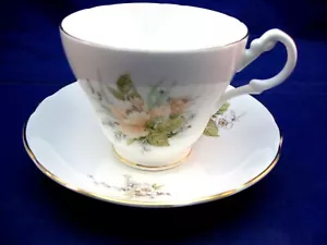 ROYAL STUART TEETASSE UND UNTERTASSE - FEINES KNOCHENPORZELLAN - BLASSE PFIRSICHFARBENE BLUMEN - Bild 1 von 9