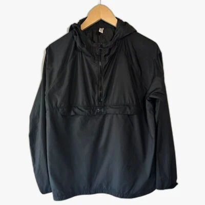 Poncho cortavientos Under Armour para mujer negro Anorak chaqueta para correr talla mediana Foto 1 de 4