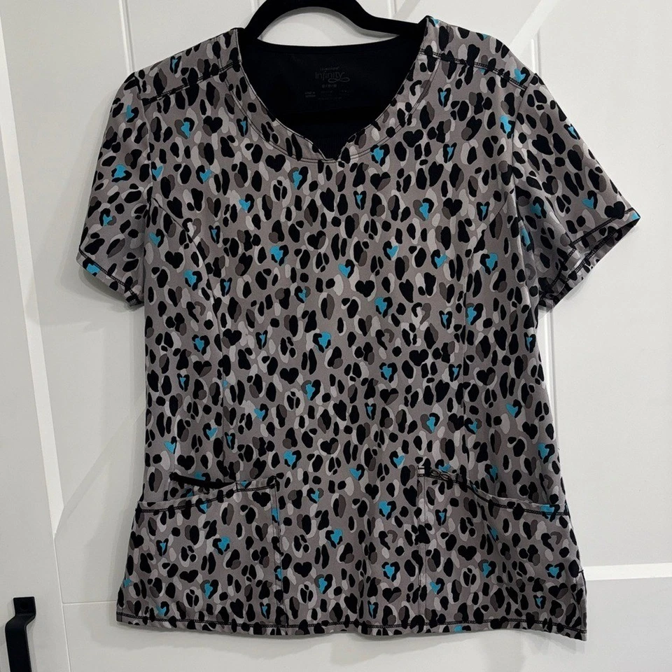 Blusa exfoliante Cherokee Infinity M con estampado de leopardo Foto 1 de 4