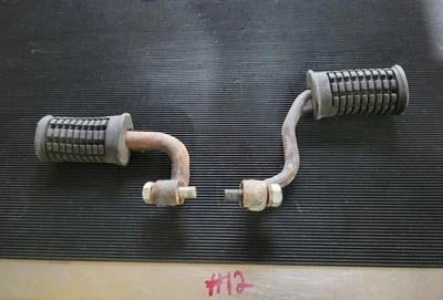 Suzuki GT750 1972 estriberas reposapiés principales de fábrica OEM Japón Foto 1 de 4