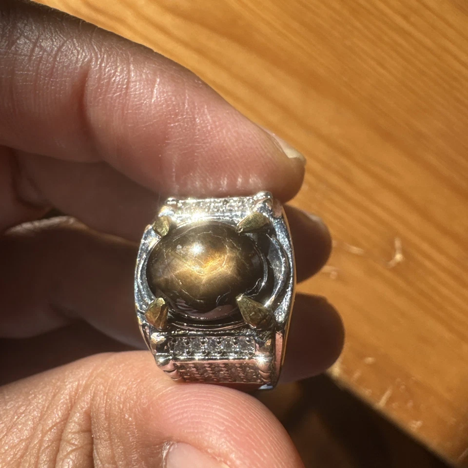 Черный сапфир драгоценный камень золотая звезда - Изображение 1 из 4