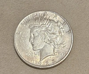 1923-S San Francisco PEACE silver dollar. AU-UNC slider, lightly cleaned. - Picture 1 of 2