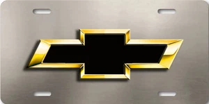 Pajarita Chevy ART dorada NEGRA sobre níquel acero aspecto aluminio matrícula etiqueta - Imagen 1 de 3