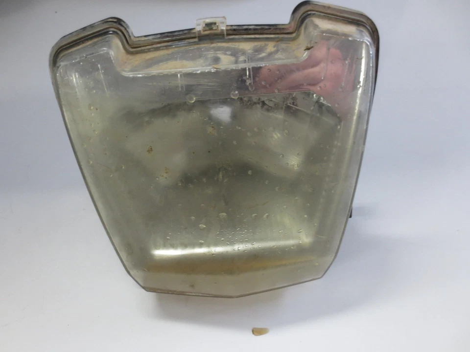 Polaris Ranger Crew 700 2008 usado OEM una luz de faro delantero - pestaña rota Foto 1 de 3