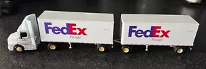 FedEx Freight Volvo 610 PEM 1:64 M77113 Die Cast Semi Tractor Trailers W/Box - Picture 1 of 12