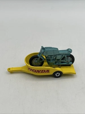 Motocicleta Matchbox Lesney #38 Honda con pata de cabra y remolque amarillo Foto 1 de 4
