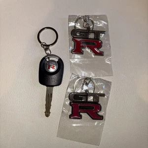 Nissan GT-R R32 R33 R34 Logo Metal Llavero Coleccionable 9cm Nuevo - Imagen 1 de 2