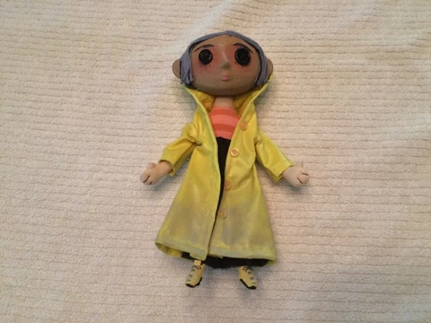 NECA Coraline Prop Replica Doll  Yellow Raincoat  Figure Approx. 9" Cover