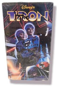 Disneys Tron (VHS, 1995) Rare Tested - plastic seal except for bottom.
