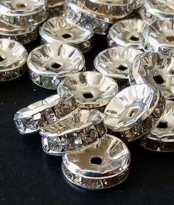 100pz perline separatori Ciambella,mm9x3 con Cristalli,colore argento,Preziosi. - Immagine 1 di 4