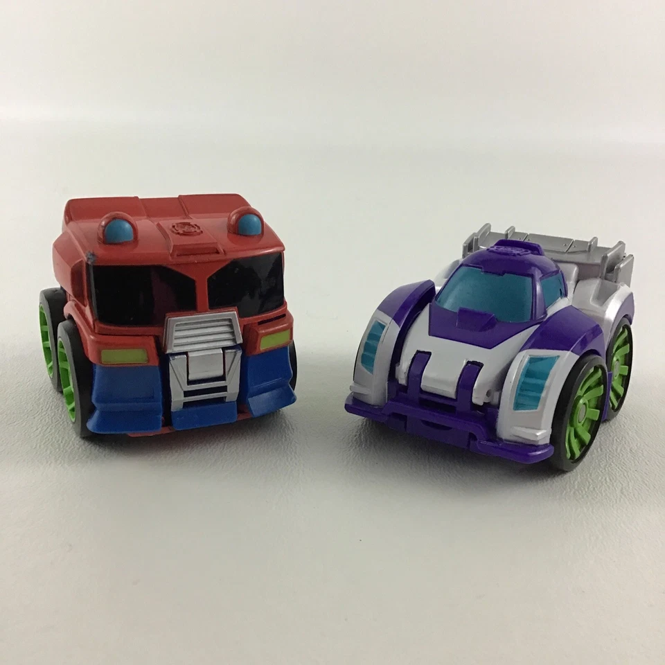 Lote de figuras Playskool Heroes Transformers Flip Racers Optimus Prime Blurr 2,5" Foto 1 de 4