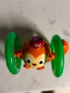 Bright StartsBright Starts Roll & Glow Monkey - Picture 1 of 6