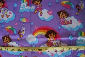 Dora and Boots all over Rainbows Purple Fabric 1/2 yard + - Picture 1 of 6