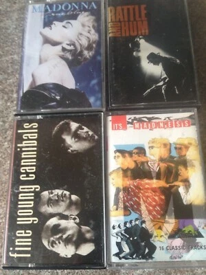 Music cassette x 4 ..... Madonna / madness / u2 / the fine young cannibals  - Image 1 of 4