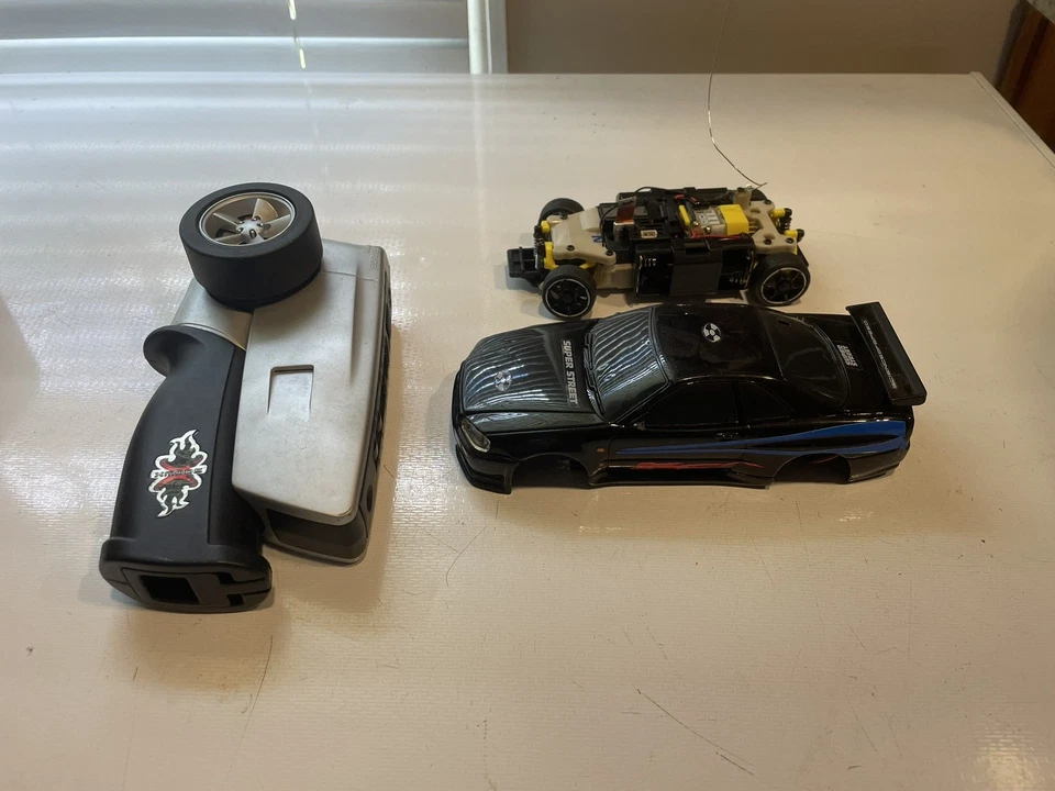 Xmods Black Nissan Skyline GTR R34 - Image 1 of 4