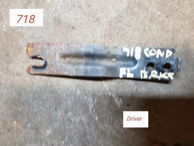 SOPORTE DE MONTAJE INFERIOR CONDENSADOR DELANTERO IZQUIERDO MITSUBISHI ENDEAVOR OEM 2004-2011 Foto 1 de 2