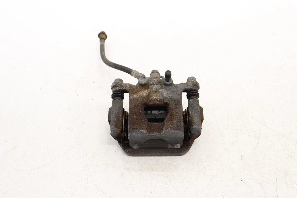 2019–2025 NISSAN ALTIMA FWD ЗАДНИЙ ЛЕВЫЙ СУППОРТ ДИСКОВОГО ТОРМОЗА СО СТОРОНЫ ВОДИТЕЛЯ ОТ ОРИГИНАЛЬНОГО ПРОИЗВОДИТЕЛЯ - Изображение 1 из 4