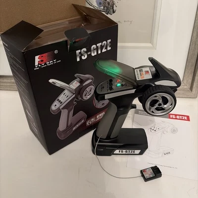 Flysky FS-GT2E AFHDS 2A 2,4Ghz 2CH Sender mit A3 Empfänger für RC Auto Boot - Bild 1 von 4
