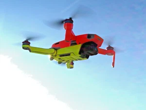 DJI mini 2 skin.  Wrap is made in fluorescent orange and yellow. Amazing visuals - Picture 1 of 13