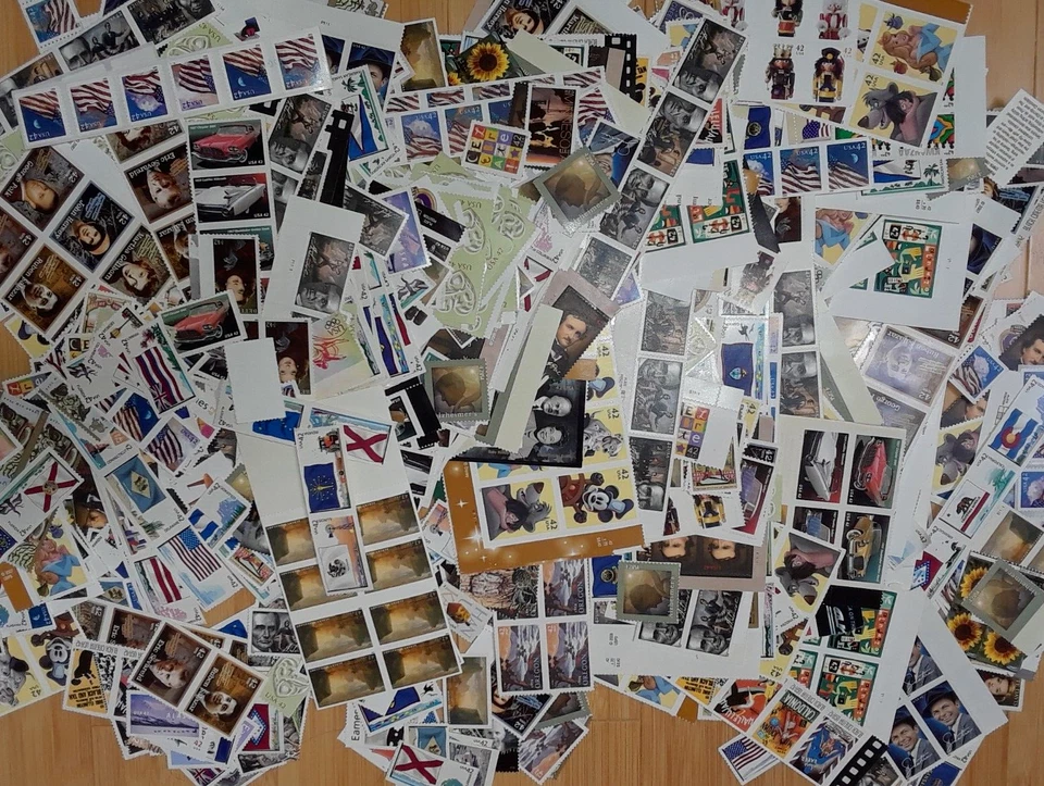 Unused 100 of Multiples & Strips & Singles of 42¢ US Postage Stamps USA FV $42.0 - Image 1 of 4