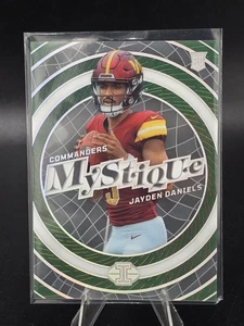 2024 Panini Illusions - Mystique Jayden Daniels #4 Emerald (RC) - Picture 1 of 2