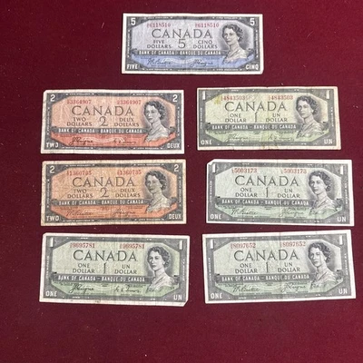 Lot of 7 1954 Canada Notes with DEVIL's FACE! Rare Find! $1, $2 & $5 Bills - Image 1 of 4