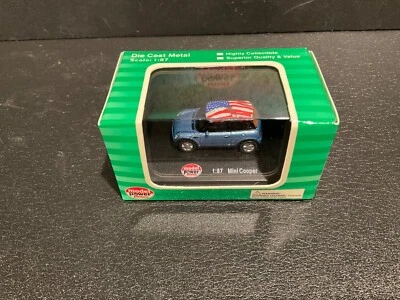Model Power Minis #19133 1:87 Mini Cooper Blue w/White Roof & American Flag. - Image 1 of 2