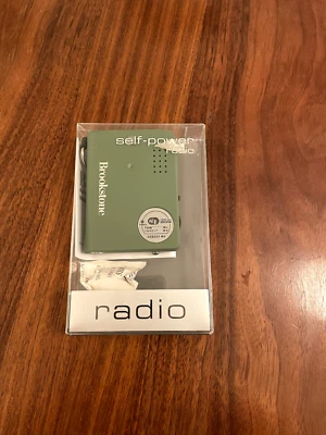 Radio autoalimentada Brookstone verde, AMFM y clima solo tira del cable sin baterías Foto 1 de 4