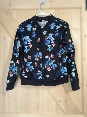 Chaqueta Adidas Niña Talla L 16 Negra Floral Cremallera con Estampado de Flores Azules Usada Foto 1 de 4
