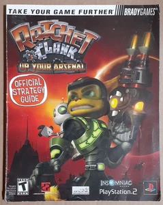 Ratchet & Clank Up Your Arsenal Bradygames Official Strategy Game Guide PS2 VG - Picture 1 of 2