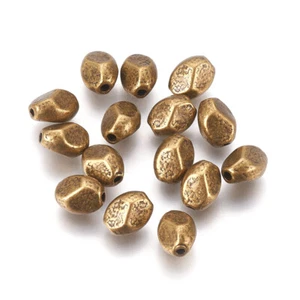 50pcs Antique Bronze Tibetan Alloy Oval Metal Spacer Beads Nickel Free 7.5x6mm - Picture 1 of 2