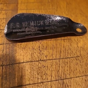 Vintage Shoe Horn F.C. REMICK & CO Portsmouth New Hampshire Ground Gripper Metal - Picture 1 of 7
