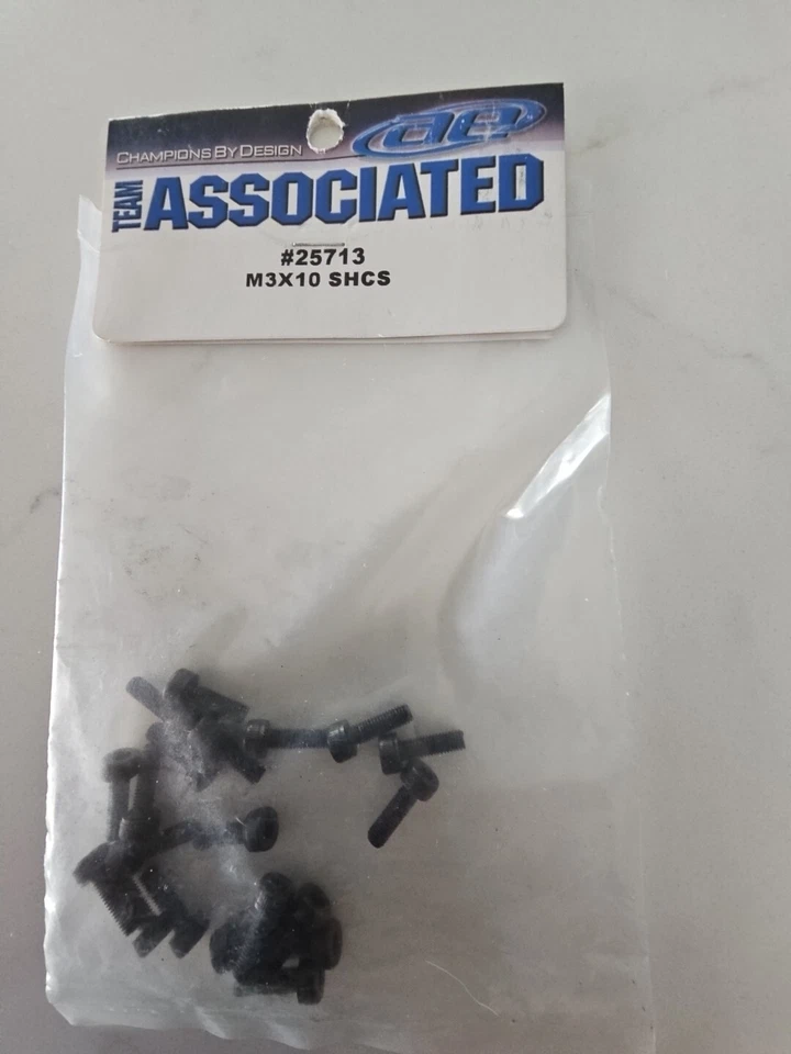 A set of ten (10) Team Associated Part #25713, Screws, M3x10mm for the SHCS - Image 1 of 1