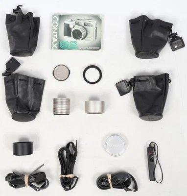 Lot of Contax Brand Camera Accessories (Filters, Cases, Straps, and More) - image 1 of 4