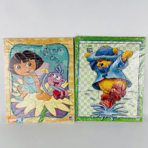 Two MB Puzzles Dora the Explorer and Winnie the Pooh 11 5/8 x 9 1/2” - Picture 1 of 5