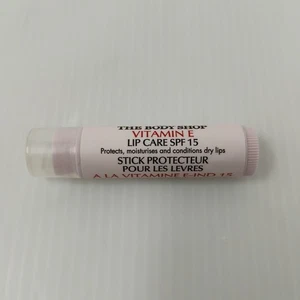 THE BODY SHOP Vitamin E Lippenpflege LSF-15 Kokosöl 4,4g Neu - Bild 1 von 6