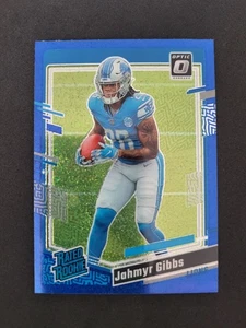 2023 Panini Donruss Optic, Jahmyr Gibbs, Rated Rookie, Blue Glitter Prizm, Lions - Bild 1 von 2