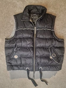Black puffer gilet zip up with grey hem and pockets size 10 - 12 - Picture 1 of 3