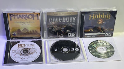 Lote de 6 juegos CD-ROM para ordenador PC años 90’s. Pharaoh + Call Of Duty + El Hobbit + Sims Foto 1 de 4