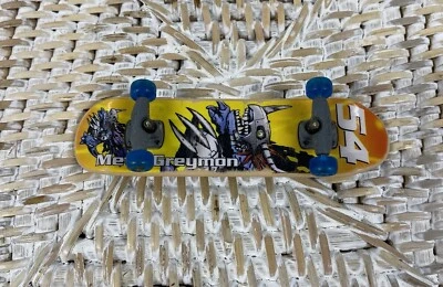 Digimon Y2K Metal Greymon Mini Patineta Diapasón Foto 1 de 4