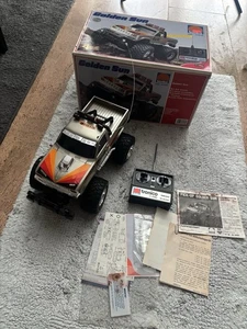 Nikko Tronico Golden Sun Toyota Hillux 1985 mit Verpackung (1 Reifen defekt) - Bild 1 von 8