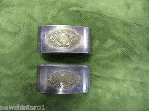 #D202. TWO SILVER PLATE NAPKIN HOLDERS - Picture 1 of 3