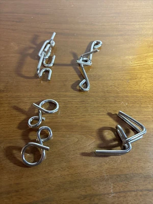 Lote de 4 rompecabezas de metal Foto 1 de 2