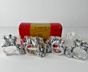 Juego de 4 servilleteros vintage Tumbling Santa - Imagen 1 de 7